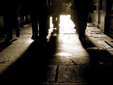 Walking feet on a dark street
